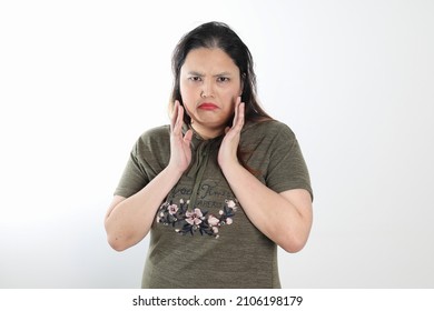 Young Plus Size South East Asian Woman Pose Face Expression Emotion On White Background Sad Hand On Cheek