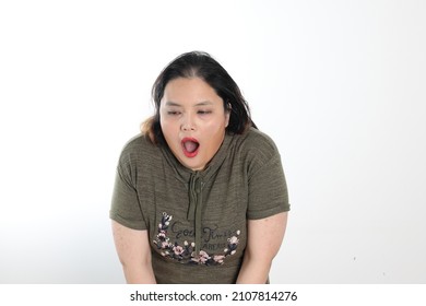 Young Plus Size South East Asian Woman Pose Face Expression Emotion On White Background Disgusting