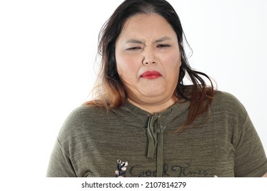 Young Plus Size South East Asian Woman Pose Face Expression Emotion On White Background Disgusted