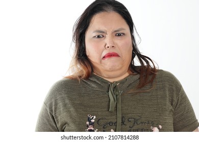 Young Plus Size South East Asian Woman Pose Face Expression Emotion On White Background Disgusted