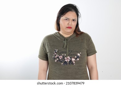 Young Plus Size South East Asian Woman Pose Face Expression Emotion On White Background Bad Disgusting