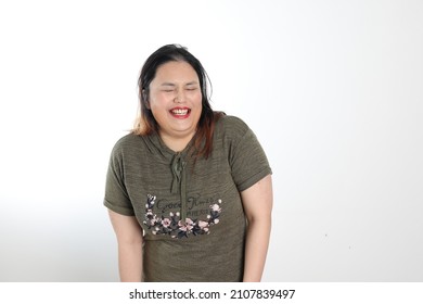 Young Plus Size South East Asian Woman Pose Face Expression Emotion On White Background Laugh Hilarious