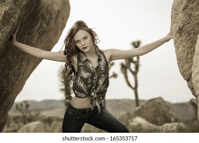 Young Portrait Model In Vintage Color Posing Outdoors With Both Arms Stretched Out 