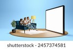 Young positive family in pajamas, man, woman and children sitting on sofa and emotionally looking at giant 3D model of tablet with empty screen. Movie, Tv show. Concept of business, Internet services