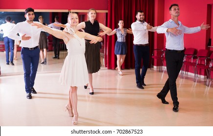 Young Positive People Dancing Together Slow Ballroom Dances In Pairs