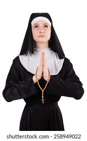 Young praying nun with beads isolated on white