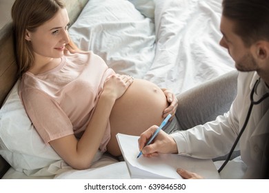 Young Preganant Woman Expecting A Baby Doctor Visit