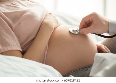 Young Preganant Woman Expecting A Baby Doctor Visit