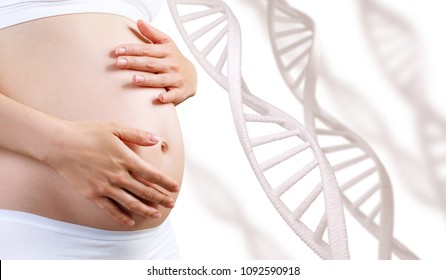 Young Pregnant Woman Caress Belly Among DNA Stem.