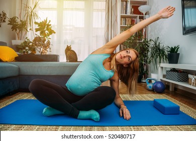 Young Pregnant Woman Doing Yoga Home Stock Photo 520480717 | Shutterstock