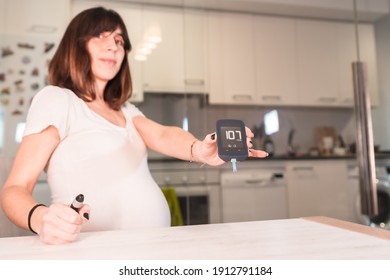 Young Pregnant Woman With Gestational Diabetes Self-test To Control Sugar, Pregnancy Difficulties