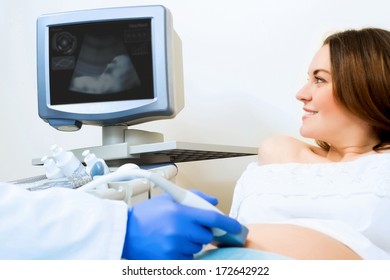 Young Pregnant Woman On The Ultrasound, Health Check