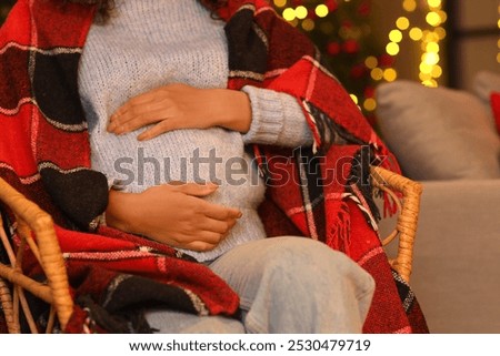 Similar – Image, Stock Photo Young pregnant woman in studio lighting