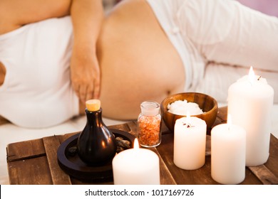 Young pregnant woman relaxing at Spa salon, Spa treatment. Ð¡oncept of beauty and health