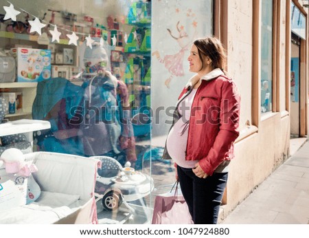 Similar – Image, Stock Photo Twin sisters laughing at a postcard in Erfurt