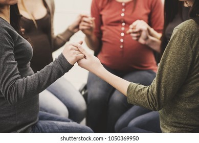 Young Pregnant Women Together At Antenatal Class At The Hospital.