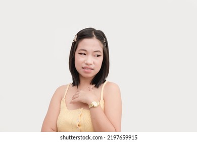 A Young Pretentious Asian Woman Showing Disgust Or Contempt. Isolated On A White Background.