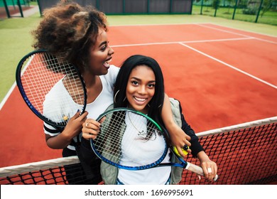 Young Pretty African Girlfriends Hanging On Tennis Court, Fashion Stylish Dressed Swag, Best Friends Happy Smiling Together