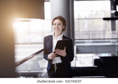 Young Pretty Business Woman At Manufacturing Enterprise