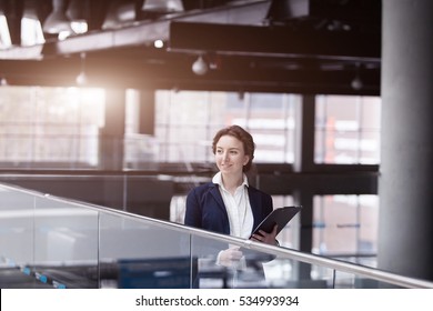 Young Pretty Business Woman At Manufacturing Enterprise