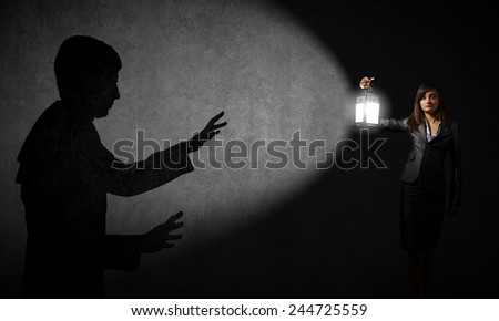 Similar – Boy with sister lighting up with flashlight