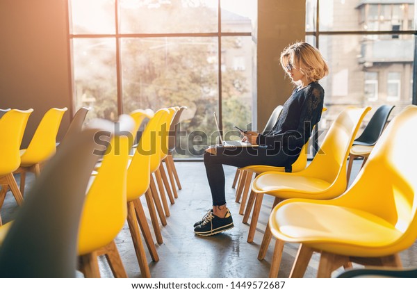 Young Pretty Busy Woman Sitting Alone Stock Photo Edit Now