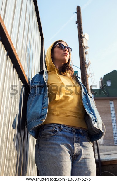 yellow hoodie with jean jacket