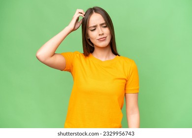 Young pretty caucasian woman over isolated background having doubts while scratching head - Powered by Shutterstock