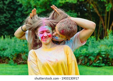 Young Pretty Couple Having Fun At Holi Fest. Spring Fest