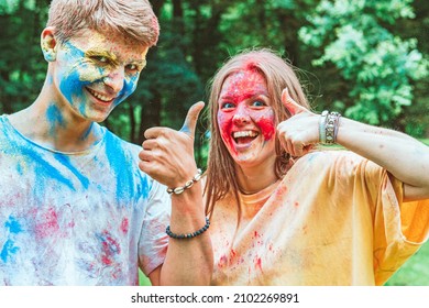 Young Pretty Couple Having Fun At Holi Fest. Spring Fest