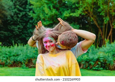 Young Pretty Couple Having Fun At Holi Fest. Spring Fest