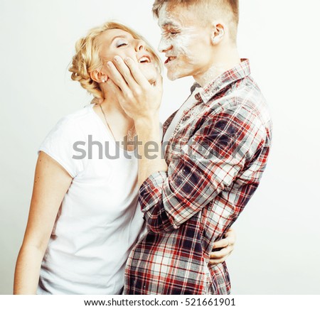 Similar – Young couple kissing in a studio portrait