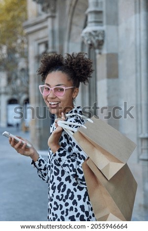 Similar – pink paper bags for shopping, inside the Christmas mask