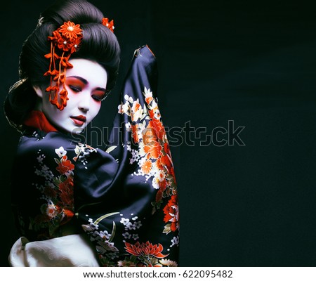 young pretty geisha in kimono