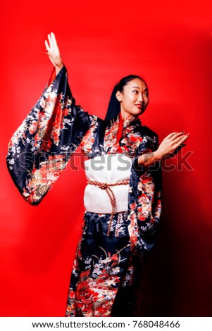 Similar – Foto Bild Frau in roten Kimono malt in blau