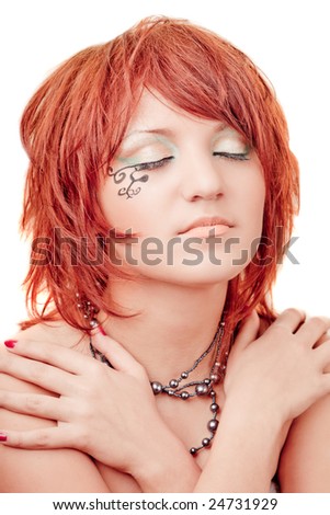Young pretty girl with closed eyes on white background