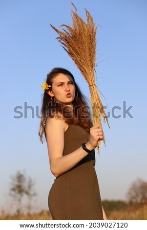 Similar – Image, Stock Photo beautiful and mysterious girl with scythe