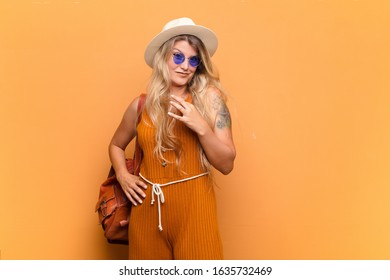 Young Pretty Latin Woman Looking Arrogant, Successful, Positive And Proud, Pointing To Self. Tourist Concept