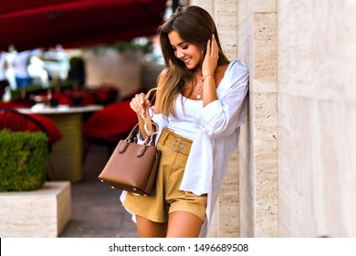 Young Pretty Magnificent Shy Brunette Young Woman Posing On Paris Street, Elegant Lady Look, Summertime, Beige Colors, Travel Experience.