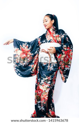 Similar – Foto Bild Frau in roten Kimono malt in blau