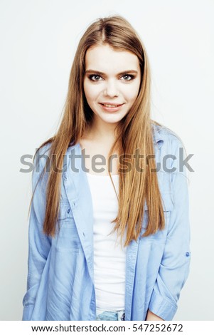 young pretty stylish hipster teen blond girl posing emotional isolated on white background happy smiling cool smile, lifestyle people concept