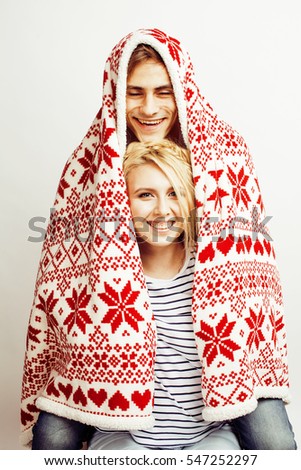 young pretty teenage couple, hipster guy with his girlfriend happy smiling and hugging isolated on white background, lifestyle people concept, valentine design winter plaid