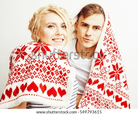 young pretty teenage couple, hipster guy with his girlfriend happy smiling and hugging isolated on white background, lifestyle people concept, valentine design winter plaid