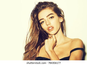 young pretty woman or cute sexy girl with long wet hair and bare shoulders, poses isolated on white background