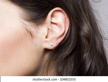 Young Pretty Woman Ear Closeup