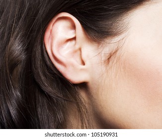 Young Pretty Woman Ear Closeup