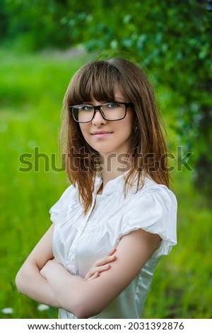 Similar – Woman, pretty, young, glasses, hat, upper body