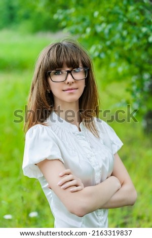 Similar – Woman, pretty, young, glasses, hat, upper body