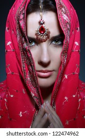 young pretty woman in indian red sari