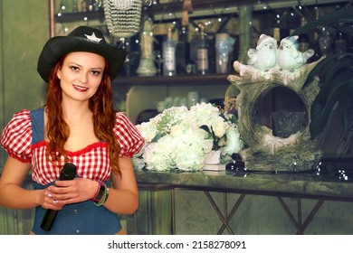 Young Pretty Woman Leading A Party, Holiday, Karaoke, Wedding In Cowboy Costume